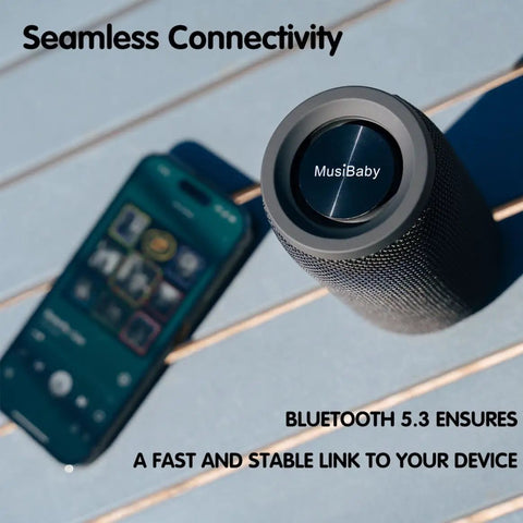 Compact Waterproof Portable Bluetooth Speaker That Goes Hard With Deep Bass, Dual Pairing, FM Radio, USB And AUX Input, 24 Hour Playtime viewed with a smartphone on a deck