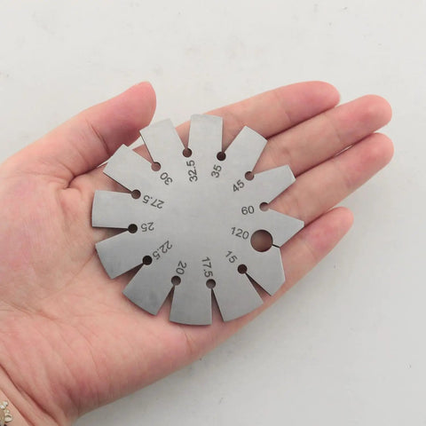 Pro Grade Knife Angle Finder Bevel Gauge Stainless Steel Round Shape 15 To 120 Degree in hand showing angle options