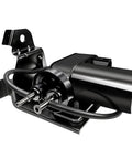Side view of UVYMZY 12V automotive vacuum pump, black metal unit with mounting bracket and hoses.