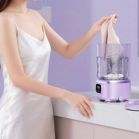 Woman using Game Changing Portable Mini Washing Machine Cordless Compact Laundry Spin Dryer for delicate fabrics.