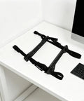 Heavy Duty Under Desk PC Tower Mount Rack With Stainless Steel Anti Vibration Caging and Heavy Duty Ratchet Straps on white desk.