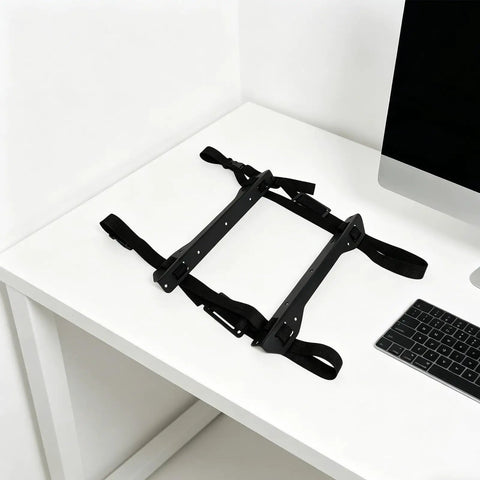 Heavy Duty Under Desk PC Tower Mount Rack With Stainless Steel Anti Vibration Caging and Heavy Duty Ratchet Straps on white desk.