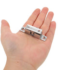 Stainless Steel Door Catch Latches Set, 4 Pack For Cabinets, Boats, And RVs, Ball Tension Roller Latch shown in hand for size reference