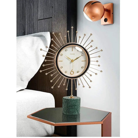Modern Marble Desktop Clock With 18K Gold Plated Frame Super Quiet Battery Sweep Movement Large Crisp Dial on side table.