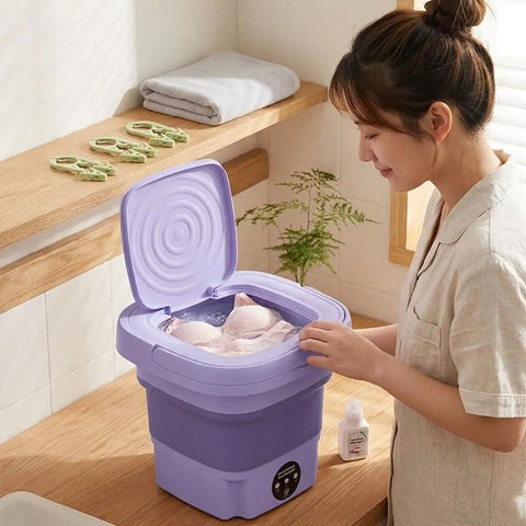 No Hustle Foldable Washing Machine With Three Deep Clean Settings And Super Chill Spin Dry for delicate bras in purple mini washer.