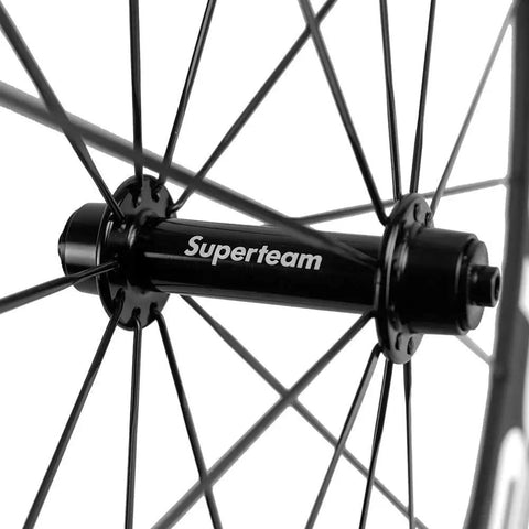 Close-up of hub on 50mm Carbon Clincher Wheelset For Road Racing 700c With 23mm Width Toray T700 Matte 3K Finish UCI Approved White And Red Decals