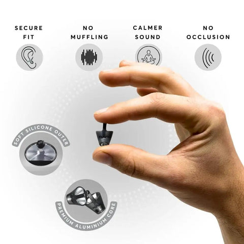 Hand holding Calmer Noise Reducing Ear Plugs Silicone Reusable For Noise Sensitivity And Travel Focus Stay Calm In Busy Environments