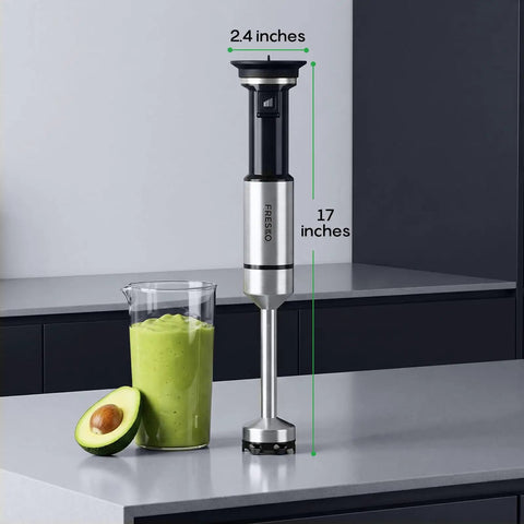 Hella Smooth Immersion Hand Blender With Variable Speed Trigger For Precision Mixing, 17 inches tall, stainless steel, with smoothie and avocado.