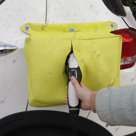 Universal EV Charger Rain Cover With Waterproof Port Shield For Electric Vehicles outdoor use, showing yellow design and water droplets.