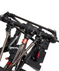 Close-up of Wrangler Style RC Crawler Chassis Frame Kit For SCX10 1 By 10 313mm Wheelbase with visible suspension and rods.