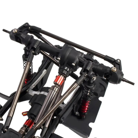 Close-up of Wrangler Style RC Crawler Chassis Frame Kit For SCX10 1 By 10 313mm Wheelbase with visible suspension and rods.