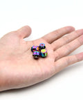 Kickass Gradient Purse Feet Hardware 4 Sets 1/2 Inch Metal Screw Back Rivet Studs in hand, colorful alloy fasteners for DIY projects.