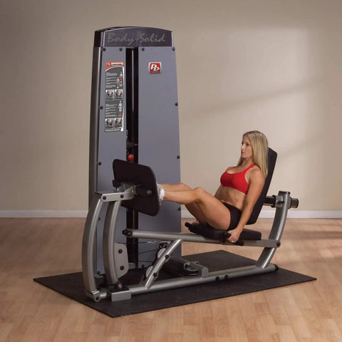 Woman using All In One Leg And Calf Press Machine with 210 lb weight stack for home gym leg press