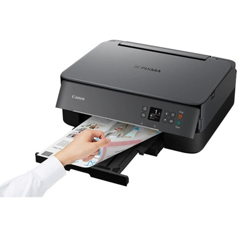 Wireless All In One Color Printer With Crisp Oled Touchscreen Display And Instant Wifi Access, printing documents with a hand visible.