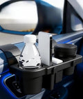 Car Door Cup Holder Organizer For Tesla Cybertruck featuring dual bottle slots, phone dock, and sundries basket on car door.