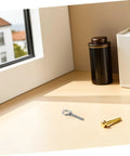 Heavy Duty Stainless Steel Threaded Eye Bolts M10x60 Set With Nuts And Washers, Rust Proof Anchor Hardware displayed on a window ledge.