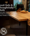 Real Deal Universal Surface Finish For Wood Leather Plastic Vinyl And Metal That Is Straight Up Waterproof And Food Safe While Acting As A Hella Solid Solvent Free Non Toxic Protection Layer Inside A Handy Four Ounce Jar For Instant Glow Ups on a food-safe wooden countertop.