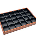 Super Dope 24 Grid Jewelry Organizer Tray Designed For Keeping Necklaces Rings Bracelets Makeup Brushes Keys And Wallets Securely Tucked Away Daily in matte black with wood trim.