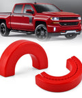 Tow Hook Cover For Silverado 1500 2007-2026 And GMC Sierra 1500 2007-2018, Red Premium Finish in front of a red Silverado