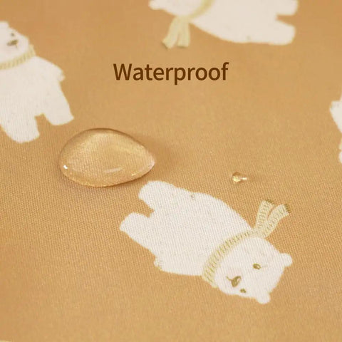 Two Pocket Wet Dry Bag Set With Handle Waterproof Reusable Storage fabric close-up with water droplets and bear pattern