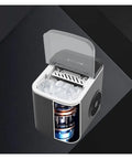 No Fuss Portable Countertop Ice Maker With Sturdy Carry Handle And Easy Self Cleaning Cycle Fast Freeze Compact Ice Machine showing ice storage and internal design.