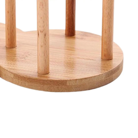 Close-up view of wooden frame base from Freestanding Cup Dispenser And Storage Rack With 6 Hooks Wooden Frame And Gold Tone Wire Portable Table Cup Holder