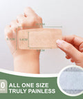 Person holding Silicone Adhesive Bandages For Fragile Skin 2x4 Inch XL Pack Of 20, showcasing breathable and painless features