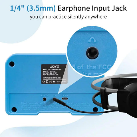 Back view of Tiny But Mighty 5W Mini Guitar Amp With Bluetooth 5.0, featuring earphone input jack, blue edition, with headphones attached.