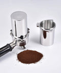 53.4mm Espresso Dosing Cup In 304 Stainless Steel With Grinder Trigger Button Fits 54mm Breville Portafilters next to coffee grounds