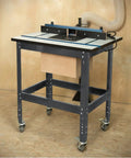 Heavy Duty Router Table Workbench Built Tough As Nails With 400 Pound Load Capacity And Adjustable Leveling Feet For Peak Shop Flexibility And Power Tool Setup on wheels with a dust collection port.
