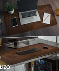 Real Leather Desk Mat Set 32 By 16 Inches Premium Full Grain Leather Desk Pad Thick 2mm Large Desk Cover Blotter Protector For Computer Gaming Mouse Pad Table Laptop Office Game Ready Boss Desk Upgrade shown with laptop, phone, and stationery in a workplace setting.