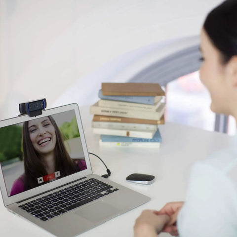 Straight Fire Top Tier HD Webcam Featuring Quick Release Privacy Shutters 1080P Full HD in use during a video call on a laptop.