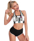 Woman wearing Pineapple Print Yoga Bra With Sunglasses Removable Padding Cross Back Sports Crop Top For Women Premium Fabric 86 Polyester 14 Spandex.