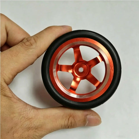 Close-up of Drift Ready CNC Metal Wheels With 65mm Drift Tires And 12mm Hex Hub For One Tenth Scale RC Cars Upgrade Parts Kit