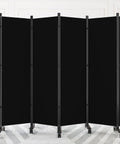 6-Foot Folding Privacy Screen With Lockable Wheels Freestanding 6-Panel Room Divider in black fabric in a living room