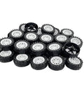 30 Piece Toy Car Wheel Set With 2Mm Shafts And 15 Metal Axles For RC Cars Trucks And DIY Robots Plastic Tire Wheels For Model Building Projects Great Replacement Parts For Hobbyists And Makers piled view