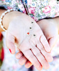 100 Pcs Mahjong Beads For Jewelry Making With Pre Drilled Holes Charms Miniature Tile Spacers in hand for DIY projects