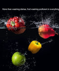 Colorful fruits splashing in water, showcasing the Compact Countertop Dishwasher With Six Place Settings And Five Wash Cycles.