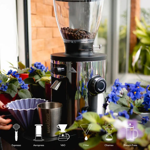 Barista Level Electric Coffee Grinder With Stepless Control And 54Mm Steel Flat Burrs Delivers Hella Consistent Grounds for Quick Home Brewing in a garden setting.