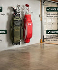 Wall Mount Golf Bag Storage Organizer For Garage And Home Use No Fuss Holds Stand Bags Cart Bags And Staff Bags Indoors Or Outdoors Perfect Golf Club Rack For Basement Practice Field Or Shed showing mounted bags in garage.
