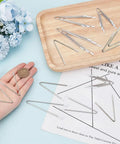 V Shaped Stainless Steel Bra Wires Replacement Kit Heavy Gauge Underwire For Bras And Corsets 24 Pairs on wooden tray