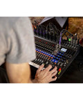 Person using LiveTrak L-20 Mixer And Multitrack Recorder For Musicians With 20 Inputs And 22 Tracks At 24-Bit 96kHz during live session