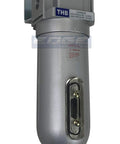 Industrial Grade In Line Desiccant Air Dryer with metal bowl and visible sight glass, 1/2 inch NPT in shop or garage for pneumatic tools.