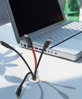 Silicone Cable Grommet Set, 12 pcs 3/4 Inch Hole Covers, installed on desk with laptop and cables, white finish for cable management