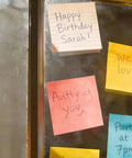 Twenty Four Pack Of 3x3 Inch Lined Sticky Notes With Ultra Strong No Slip Adhesive For Windows Displayed with Messages