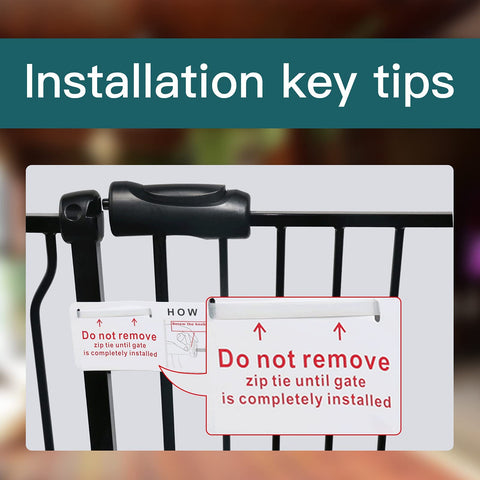 Close-up of installation tips and zip tie on Extra Wide Baby Gate For Doorways And Stairs, Pressure Mounted Black Metal Walk Through Design