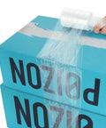 Using Snag This Gotta Have 6 Roll Stretch Wrap Film Set With Premium 80 Gauge Cling Plastic on stacked boxes during packing.