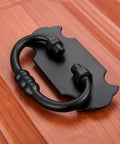 Two Pack Antique Black Cabinet Handle Pulls with Screws easy install on wooden cabinet door.