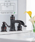 Widespread 8 Inch Two Handle Bathroom Faucet With Pop Up Drain Assembly Waterfall Style Oil Rubbed Bronze Finish visible on sink