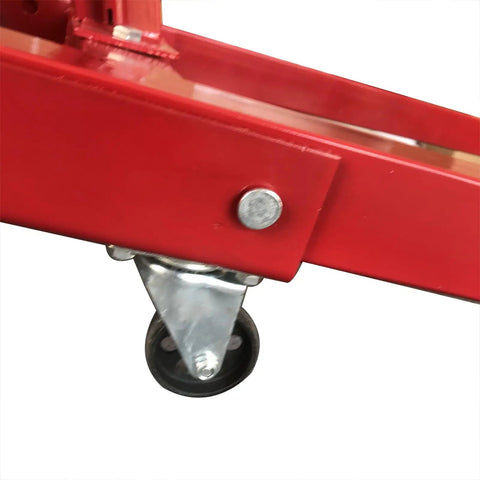 Heavy Duty Folding Engine Hoist And Cherry Picker Garage Workhorse crushing heavy loads with swivel caster detail.